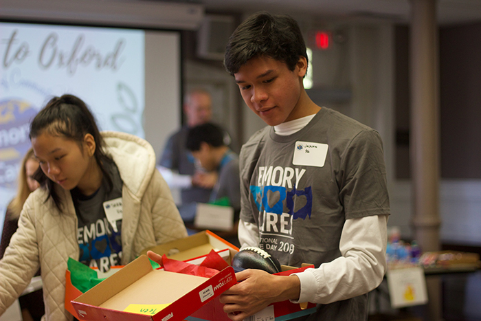 Packing gift boxes for children in the Newton County foster care program